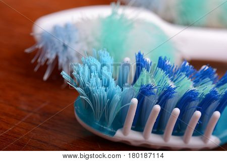 xtreme Macro close up of toothbrush with wooden background