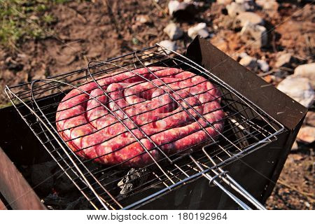 Travel Kielbasa Cooking. Uncooked Sausages