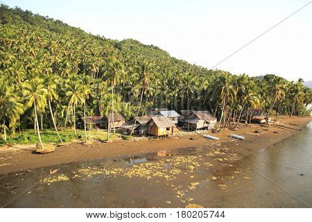Riverside village, Carrascal, Surigao del Sur
Nipa huts along the riverside can be seen from zip line in Carrascal, Surigao del Sur, Philippines.