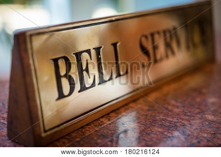 Signs bell on the table in a luxury hotel in morning.
