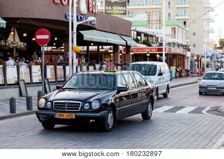 PROTARAS, CYPRUS - 10 OCT 2016: Taxi cars on the street