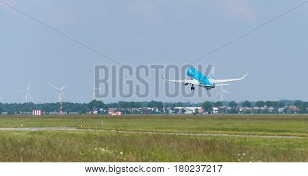 SCHIPHOL NETHERLANDS - JUNE 4 2016: KLM airplane takes off at amsterdam international airport. There are 163 destinations served by KLM