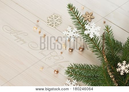 New Year's still-life with branches of a Christmas tree. Greeting card.