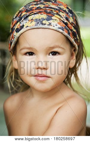 Portrait of a smiling girl asian-mestizo close-up