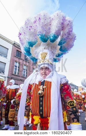 BINCHE BELGIUM - FEB 28 : Participants in the Binche Carnival in Binche Belgium on February 28 2017. The Binche carnival is included in a list of intangible heritage by UNESCO.