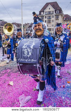 BASEL SWITZERLAND - MARCH 08 : Participants in the Basel Carnival in Basel Switzerland on March 08 2017. The Basel carnival has been listed as one of the top local festivities in Europe