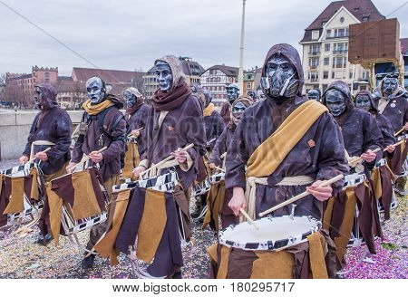 BASEL SWITZERLAND - MARCH 08 : Participants in the Basel Carnival in Basel Switzerland on March 08 2017. The Basel carnival has been listed as one of the top local festivities in Europe