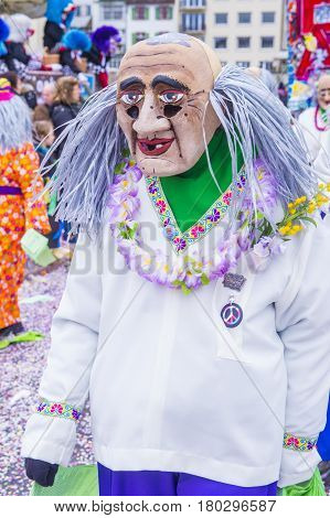 BASEL SWITZERLAND - MARCH 08 : Participants in the Basel Carnival in Basel Switzerland on March 08 2017. The Basel carnival has been listed as one of the top local festivities in Europe