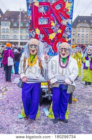 BASEL SWITZERLAND - MARCH 08 : Participants in the Basel Carnival in Basel Switzerland on March 08 2017. The Basel carnival has been listed as one of the top local festivities in Europe