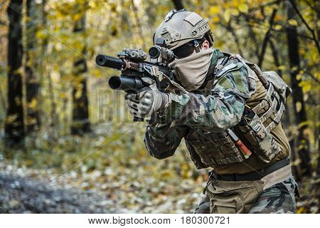 United states Marine Corps special operations command Marine Special Operator also known as Marsoc raider wearing camouflage uniforms in the forest
