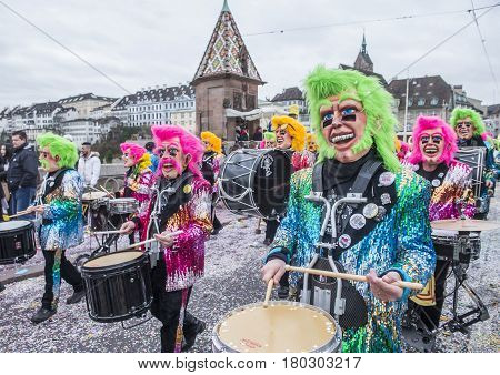 BASEL SWITZERLAND - MARCH 08 : Participants in the Basel Carnival in Basel Switzerland on March 08 2017. The Basel carnival has been listed as one of the top local festivities in Europe