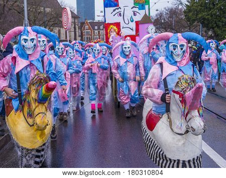 BASEL SWITZERLAND - MARCH 08 : Participants in the Basel Carnival in Basel Switzerland on March 08 2017. The Basel carnival has been listed as one of the top local festivities in Europe