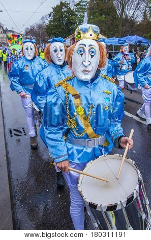 BASEL SWITZERLAND - MARCH 08 : Participants in the Basel Carnival in Basel Switzerland on March 08 2017. The Basel carnival has been listed as one of the top local festivities in Europe