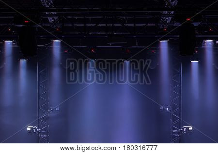A view from above of the ceiling of a concert stage with spotlights on a Stage farm