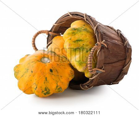 Gourds in a basket isolated on a white background
