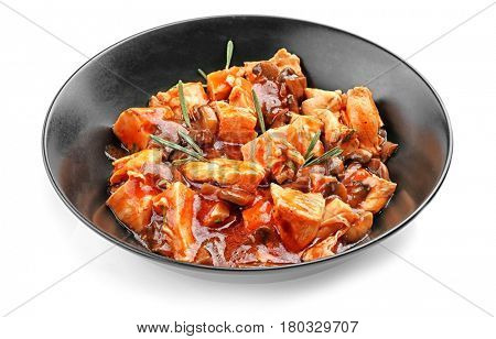 Chicken cacciatore in plate isolated on white