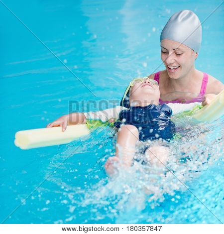 Swimming On Back With Water Noodle