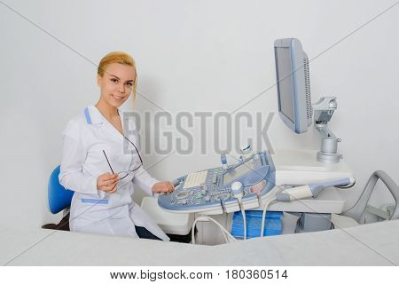 Doctor Working At Ultrasound Diagnostic Machine