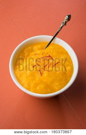 alphonso mango pulp or hapus aam ras or amba ras in marathi, selective focus