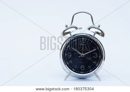 Alarm clock isolated on white background, stock photo