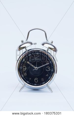 Alarm clock isolated on white background, stock photo