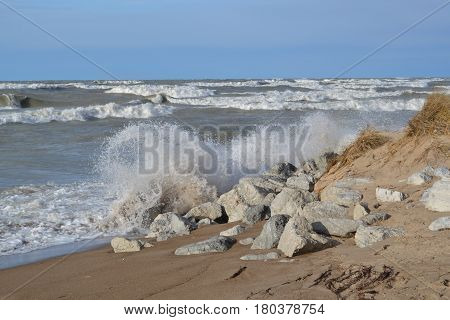 High waves crashing against rocks Lake Michigan
