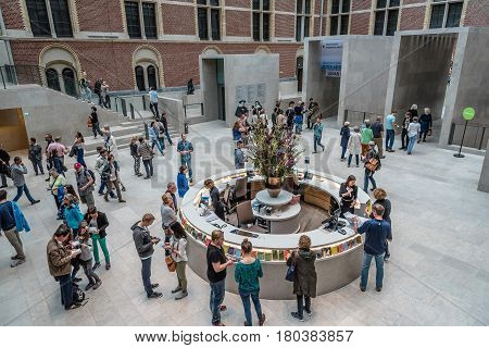 Amsterdam Netherlands - August 3 2016: High angle view of main hall of Rijksmuseum with a crowd of people. The Rijksmuseum is a Dutch national museum dedicated to arts and history in Amsterdam.