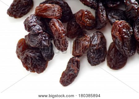 Raisin / A raisin is a dried grape. Raisins are produced in many regions of the world and may be eaten raw or used in cooking, baking, and brewing.