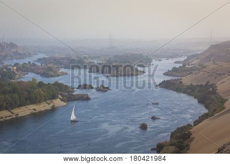 Feluccas Sailing On The Nile Near Aswan, Egypt