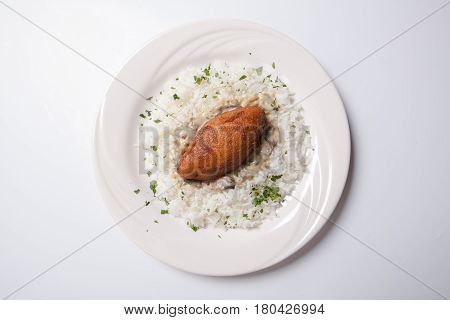 Cordon Bleu With Rice On A White Plate