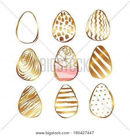 Hand drawn vector abstract Easter brush painted eggs collection set with floral motif in golden colors isolated.Easter spring decorations backgrounds.Easter designs elements.Eggs hunt concept.Elegant