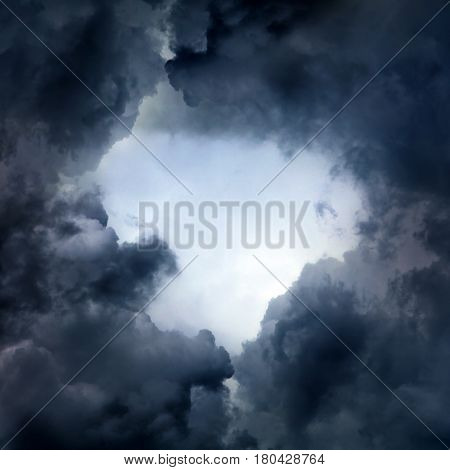 Hole of the Sky in the Dark Storm Clouds