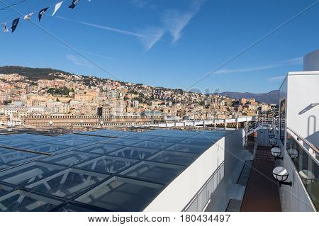 Genoa Liguria Italy - February 26 2017: Cityscape view of Genoa town from open upper deck of cruise liner MSC Splendida