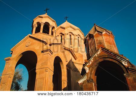 Photo of the Katoghike Holy Mother of God Church and Saint Anna Church. Armenian architecture. Yerevan City center, Armenia. Religious background. Travel concept.