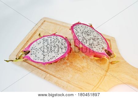 Exotic Fruit Pitaya Or Pitahaya, Dragon Fruit (hylocereus Undatus) On Wooden Board Isolated On White