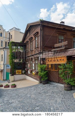 Kiev Ukraine - June 04 2016: Restaurant in an old wooden house on Andreevsky Spusk - the historical center of the city