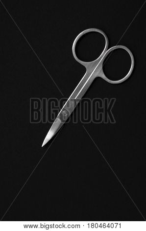 Scissors For Manicure Woman Nails On A Black Background. Tools