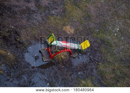 Swings Stand In A Water After Rain In The Spring