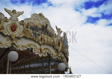Photo Carousel vintage with Cloudy Blue Sky