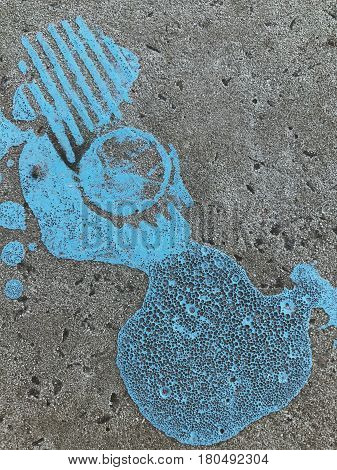 Bkue painted stain on concrete gray background