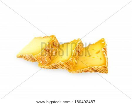 Three soft washed-rind cheese slices isolated on white