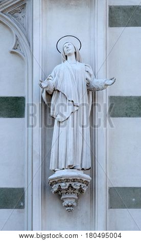 ROME, ITALY - SEPTEMBER 02: Statue of St. Margaret Mary Alacoque on the facade of Sacro Cuore del Suffragio church in Rome, Italy  on September 02, 2016.