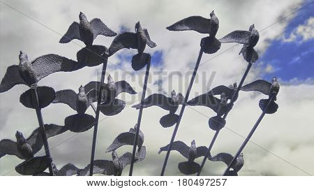 First floor art Pigeons Statue in the cloudy sky