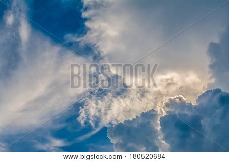 The sky is blue color and clouds is white color.