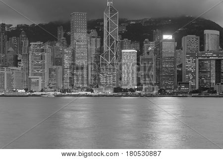 Black and White Hong Kong city by the Victoria Bay at night cityscape downtown background