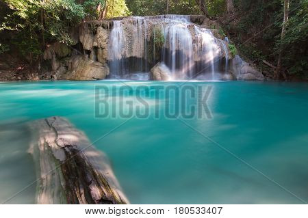 Deep blue stream watefall in deep forest jungle natural landscape background
