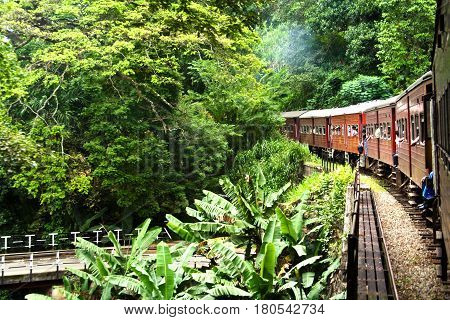 riding by train the scenic mountain track from Nuwarelia to Colombo