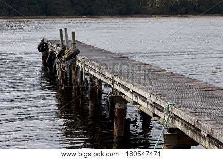 Jetty at Lettes Bay, Strahan on west coast of Tasmania, Australia