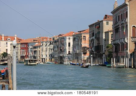 VENICE ITALY - AUGUST 5: Scenic view of Grand Canal on August 5 2012 in Venice Italy. More than 20 million tourists come to Venice annually