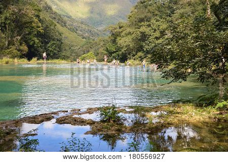 Beautiful turquoise pools surrounded by the jungle in Semuc Champey in Alta Verapaz region Guatemala